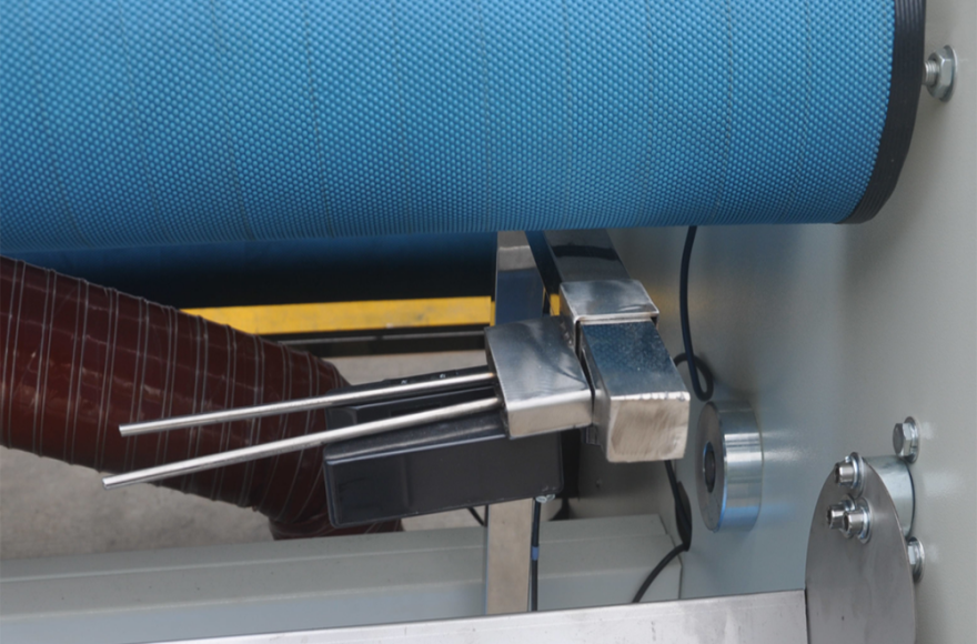 富怡吹風式自動對邊松布機