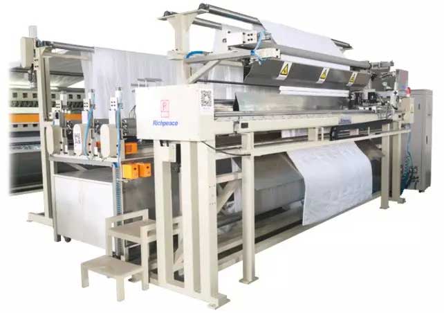 富怡被芯自動化生產線關鍵環(huán)節(jié)之大旋梭多針電腦絎縫機+全自動鎖四邊縫紉機